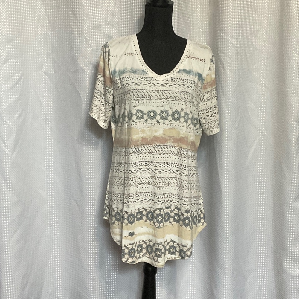 LuLaRoe Cream and Blue Patterned Short Sleeve Top 4 tops for one price.